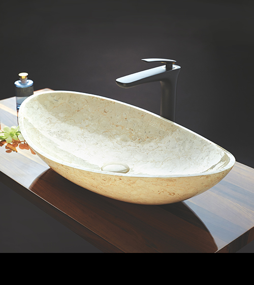 Cream coloured store wash basin